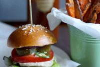 Vegan Falafel Burger with Tahini Sauce and Crispy Sweet Potato Fries