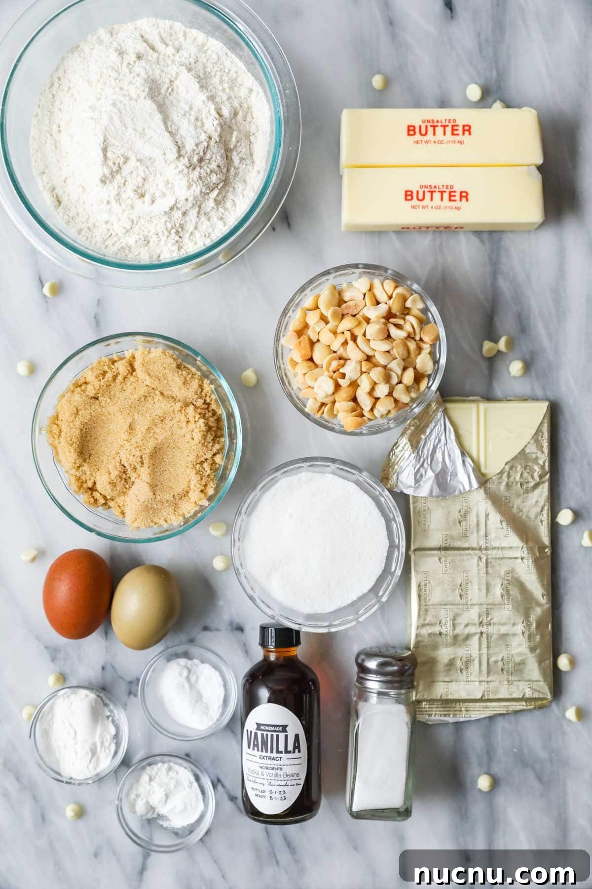 White Chocolate Macadamia Nut Cookies Recipe for Chewy, Crisp Bites 3 Overhead view of ingredients including macadamia nuts, white chocolate, brown sugar, and more.
