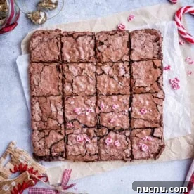 Over 10 Festive Christmas Dessert Recipes for Holiday Gatherings 11 Peppermint brownies cut into squares.