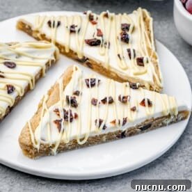 Over 10 Festive Christmas Dessert Recipes for Holiday Gatherings 14 Three bliss bars on a white plate.