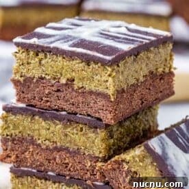 Over 10 Festive Christmas Dessert Recipes for Holiday Gatherings 5 Dubai Brownie squares stacked over each other.
