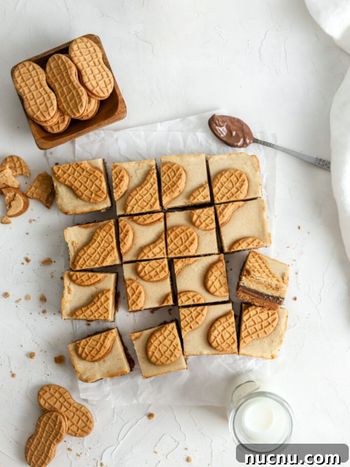 Nutter Butter bar squares, a jug of milk and Nutter Butter cookies. 