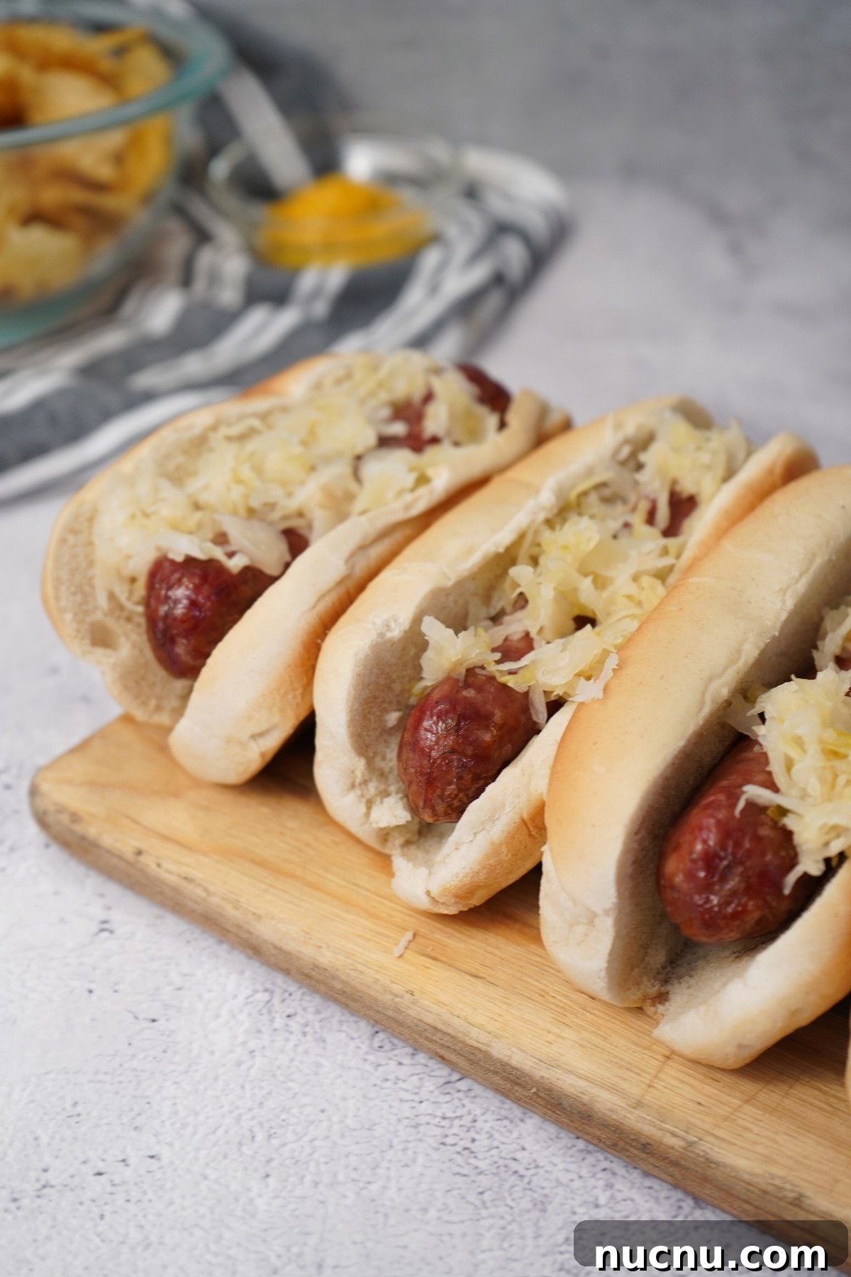 Smoked Bratwurst Recipes: Juicy Grilled Brats with Sauce Ideas 3 smoked brats served