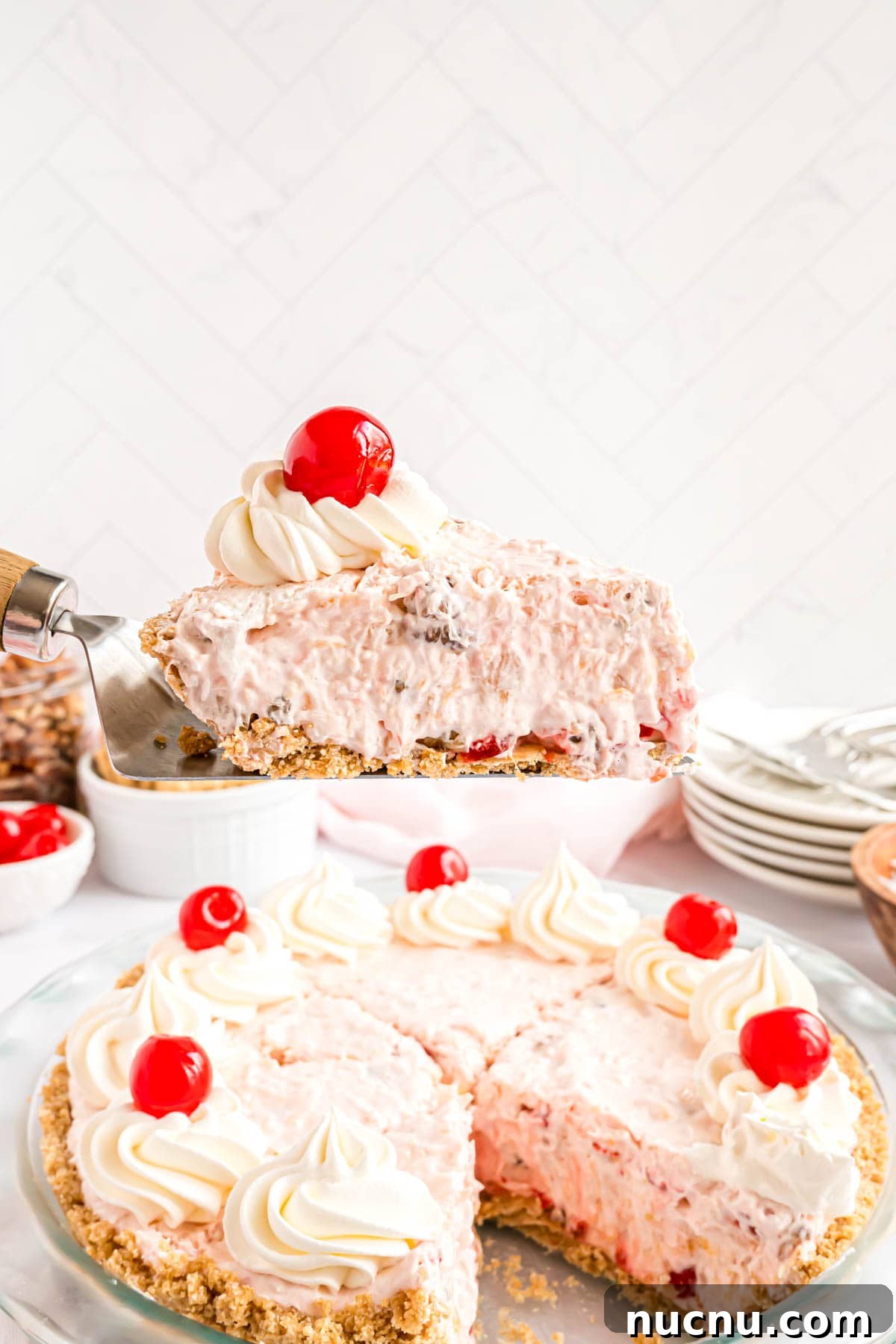 Slice of millionaire pie being lifted from pie plate.