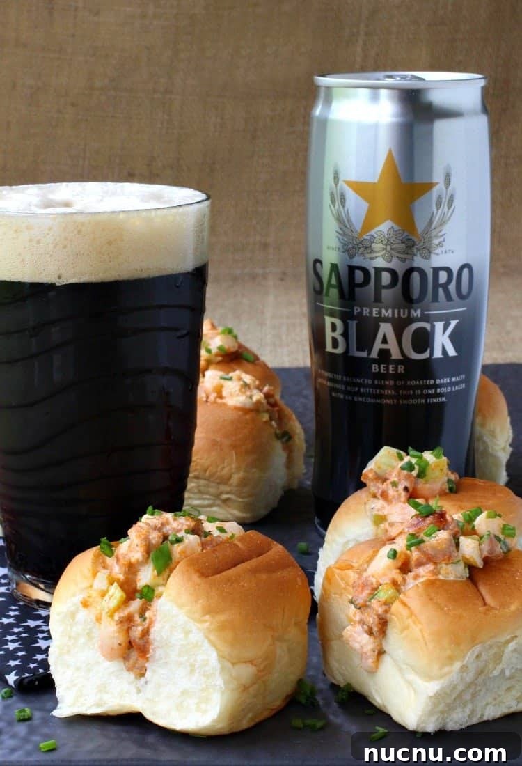 Spicy Shrimp Salad Sliders are so fun for parties! A delicious, creamy shrimp salad kicked up with chorizo and piled into soft sliders buns! img 12080 4