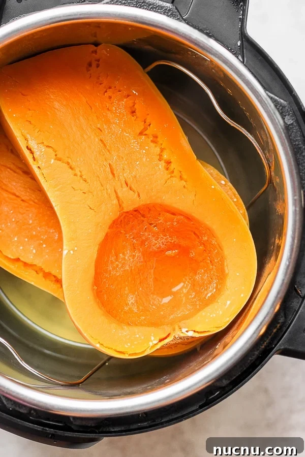 Fully cooked butternut squash halves in the Instant Pot.