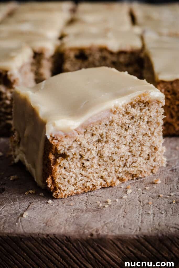 Gluten-Free Caramel Cake Recipe: Moist, Decadent Dessert 2 A slice of gluten-free caramel cake on a wooden board