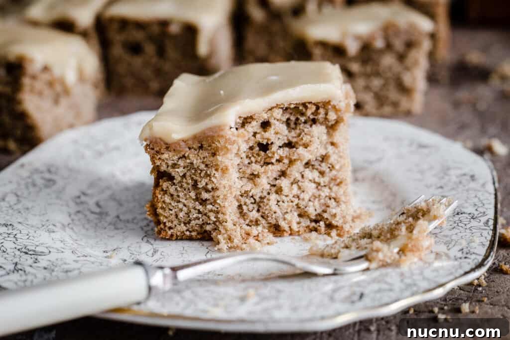 Gluten-Free Caramel Cake Recipe: Moist, Decadent Dessert 4 A slice of gluten-free caramel cake on a plate with a bite taken out of it