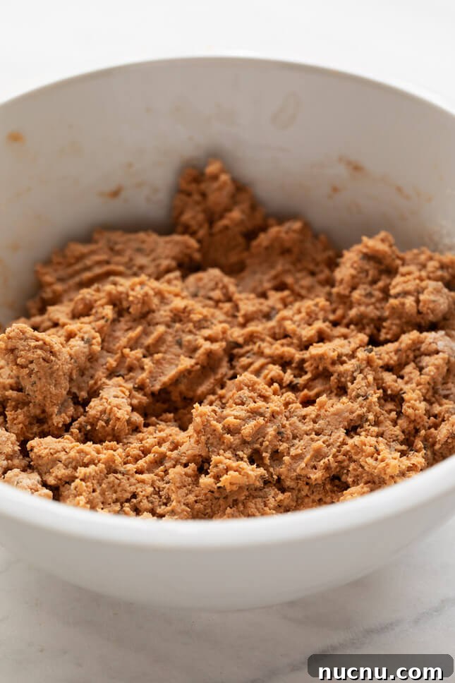 Vegan breakfast sausage made with textured vegetable protein, flour, vegetable stock and tons of herbs and spices. It tastes like the real thing! #vegan #glutenfree #breakfast #simpleveganblog Vegan Breakfast Sausage