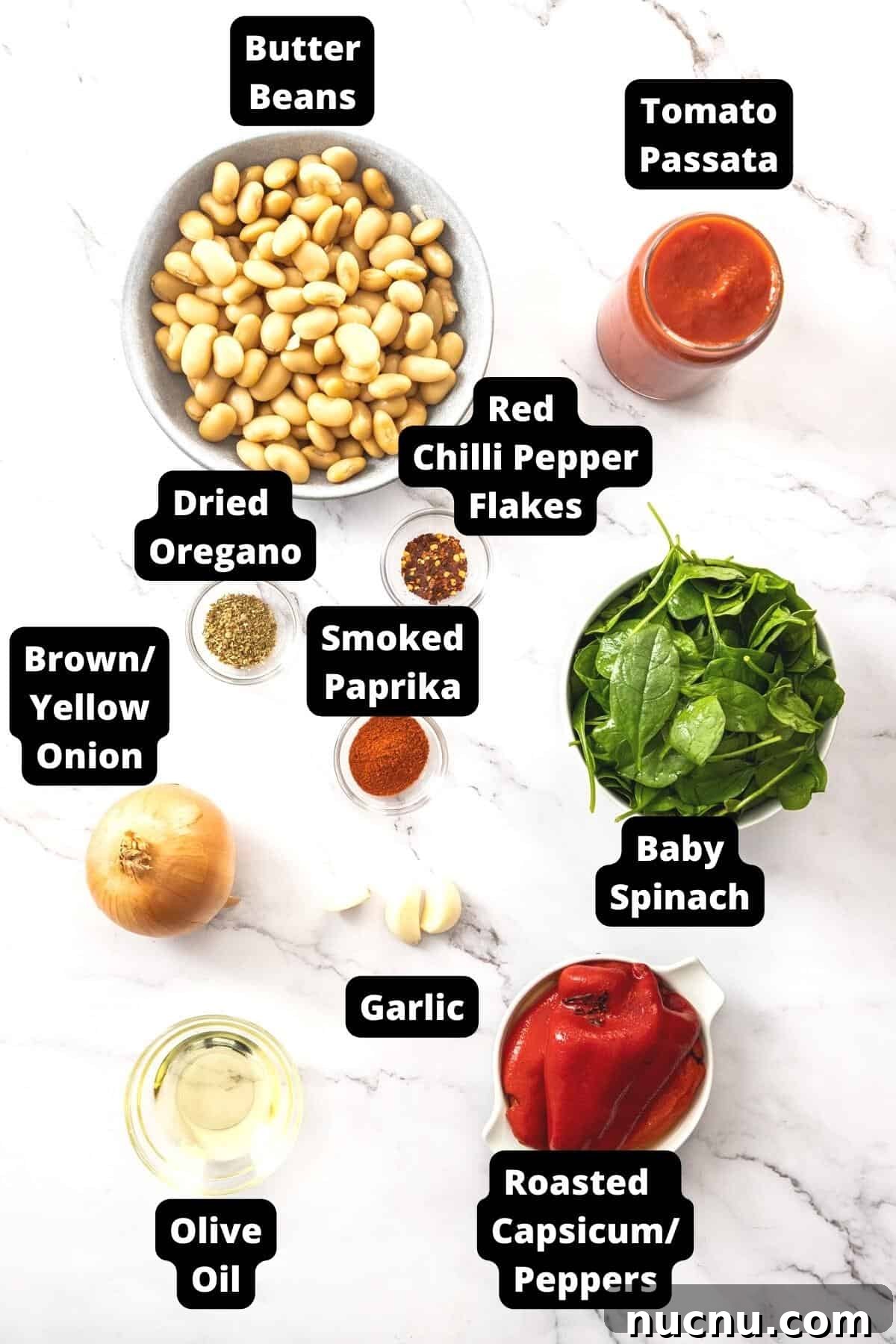 Creamy Butter Bean Salad with Lemon & Herbs — Quick Summer Side 3 Ingredients in this recipe on a white marble background.