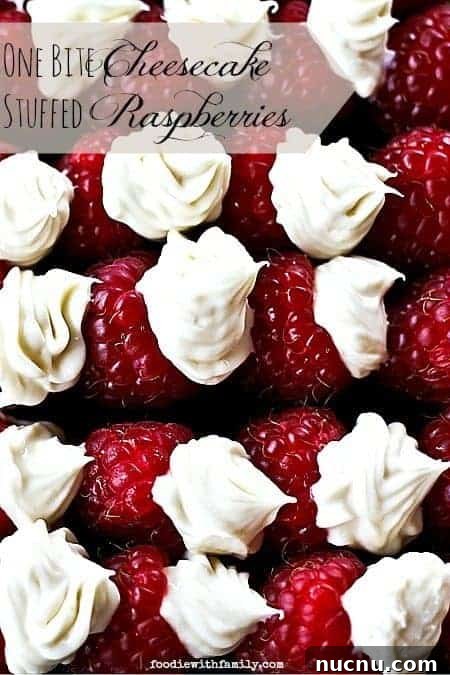 Mini Cheesecake-Stuffed Raspberries: Bite-Sized Dessert Bites 4 One Bite Cheesecake Stuffed Rasperries with Chambord foodiewithfamily.com #cheesecake #Dessert
