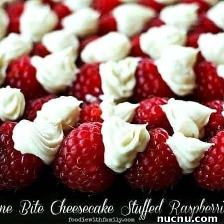 Mini Cheesecake-Stuffed Raspberries: Bite-Sized Dessert Bites 5 One Bite Cheesecake Stuffed Rasperries with Chambord foodiewithfamily.com #cheesecake #Dessert