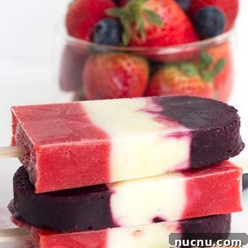 Red White and Blue Berry Yogurt Pops - Yogurt Pops for the 4th of July. They're full of fresh berries and lemon yogurt!