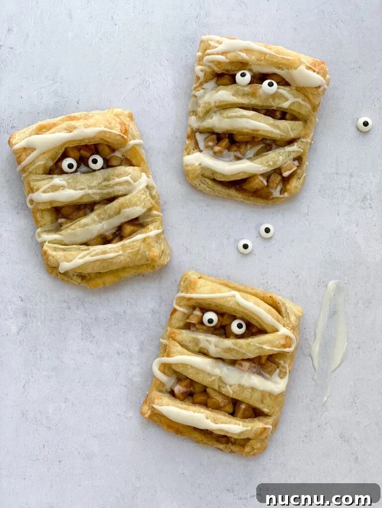 3 hand pies with googly eyes around them