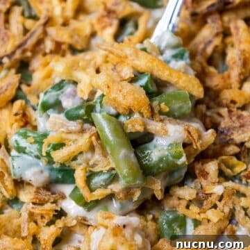 Double Green Bean Casserole Recipe for Family-Sized Meals 13 Green bean casserole with crispy fried onions.