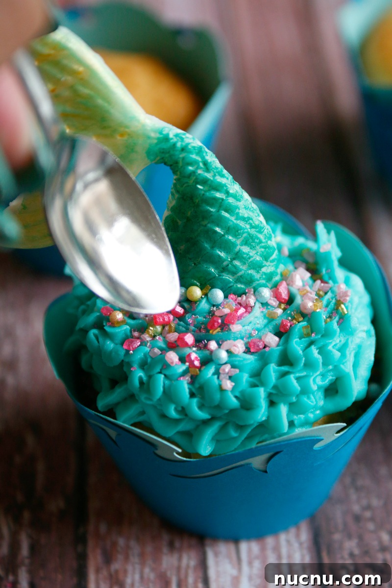 Mermaid Tail Cupcakes: Step-by-Step Recipe for Stunning Treats 11 These adorable mermaid tail cupcakes are easy to make with this tutorial and the perfect addition to your Under The Sea party.