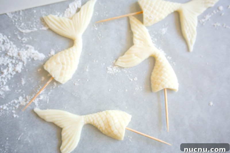 Mermaid Tail Cupcakes: Step-by-Step Recipe for Stunning Treats 5 These adorable mermaid tail cupcakes are easy to make with this tutorial and the perfect addition to your Under The Sea party.