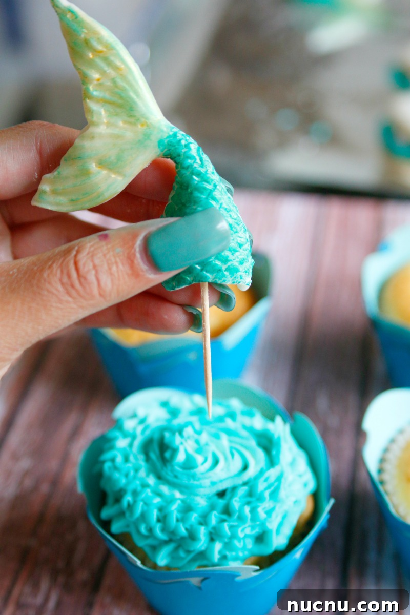 Mermaid Tail Cupcakes: Step-by-Step Recipe for Stunning Treats 9 These adorable mermaid tail cupcakes are easy to make with this tutorial and the perfect addition to your Under The Sea party.