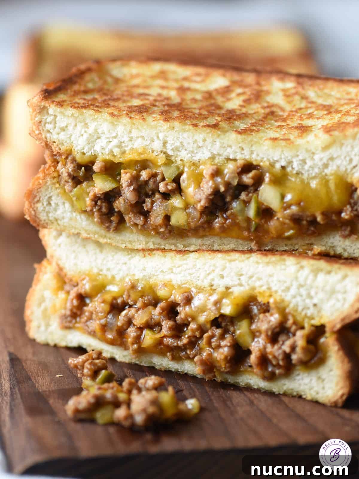 2 half sloppy joe grilled cheese stacked