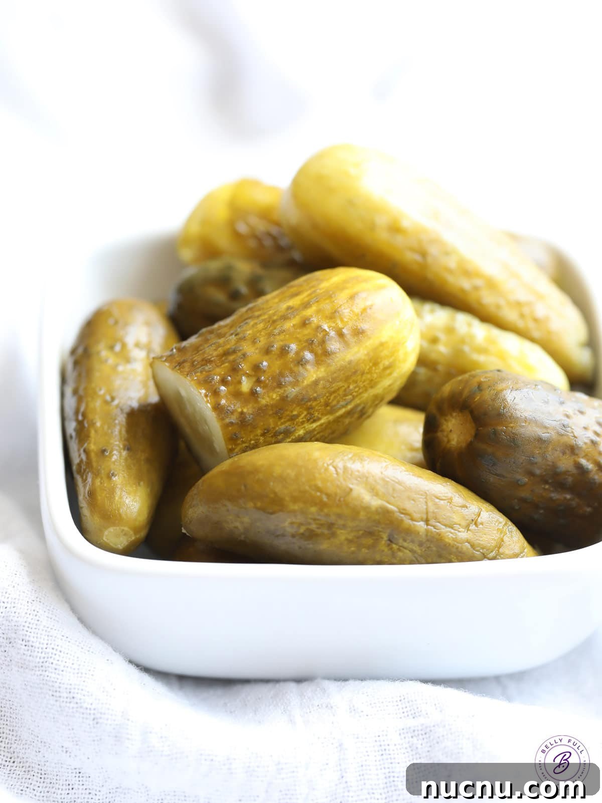 bowl of whole dill pickles
