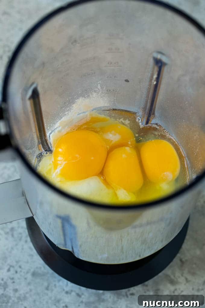 Dutch Baby Ingredients Eggs, milk, sugar and flour in a blender.