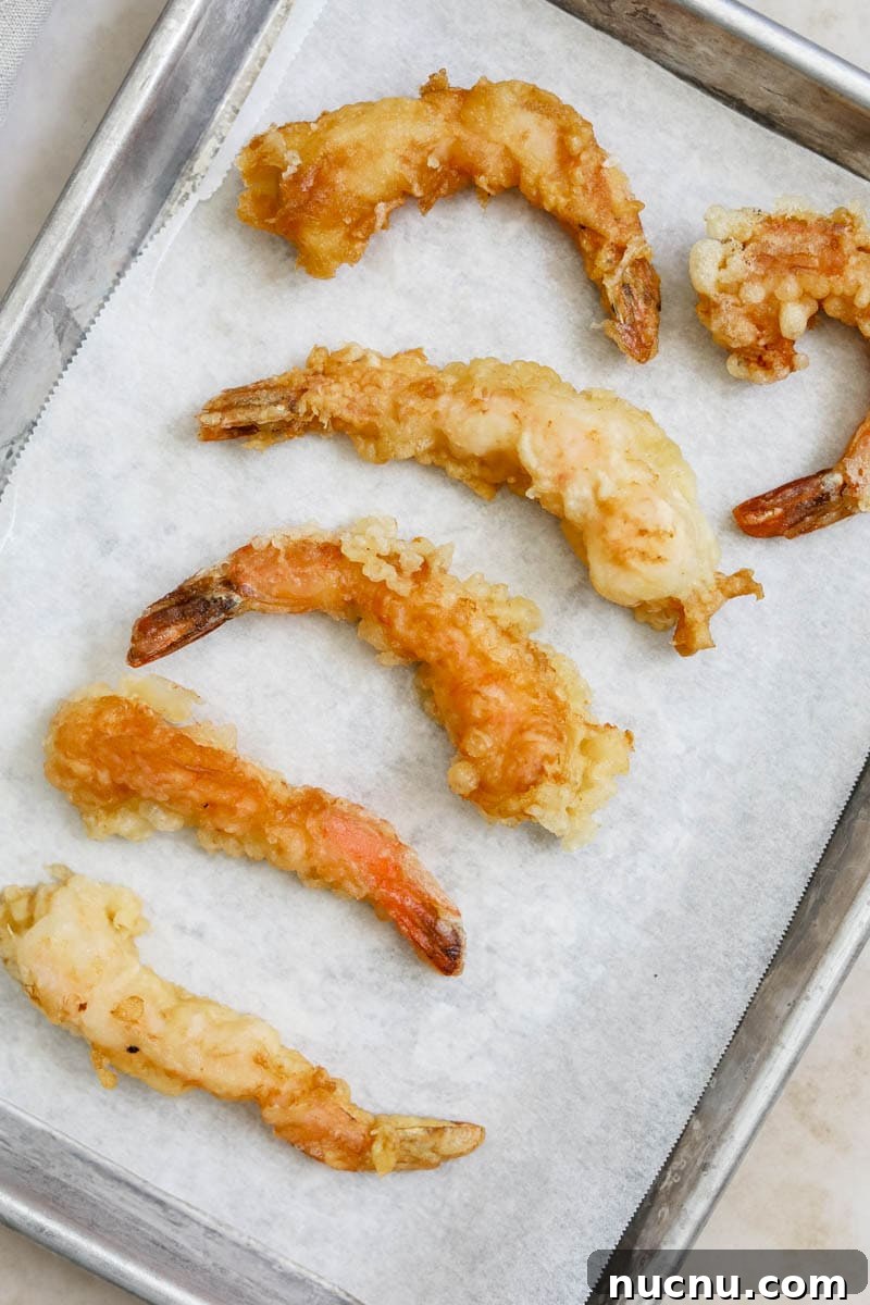 crispy ebi shrimp tempura on a sheet pan.