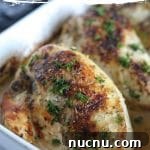 zesty Italian chicken in a glass white dish.