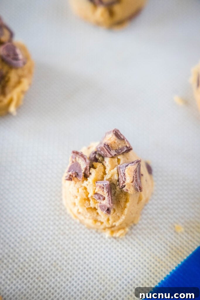 Chewy Reese’s Peanut Butter Cookies Recipe 4 cookie dough on a baking sheet
