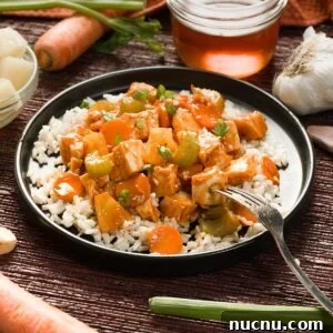 Gluten-Free Sweet and Sour Chicken Made in a HexClad Pan 16 Healthy Gluten-Free Sweet and Sour Chicken on a plate.