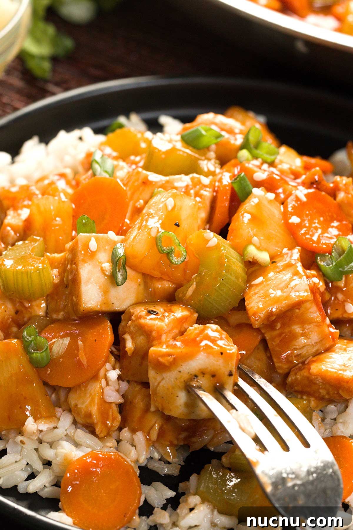 Gluten-Free Sweet and Sour Chicken Made in a HexClad Pan 3 Healthy Gluten-Free Sweet and Sour Chicken on a plate.