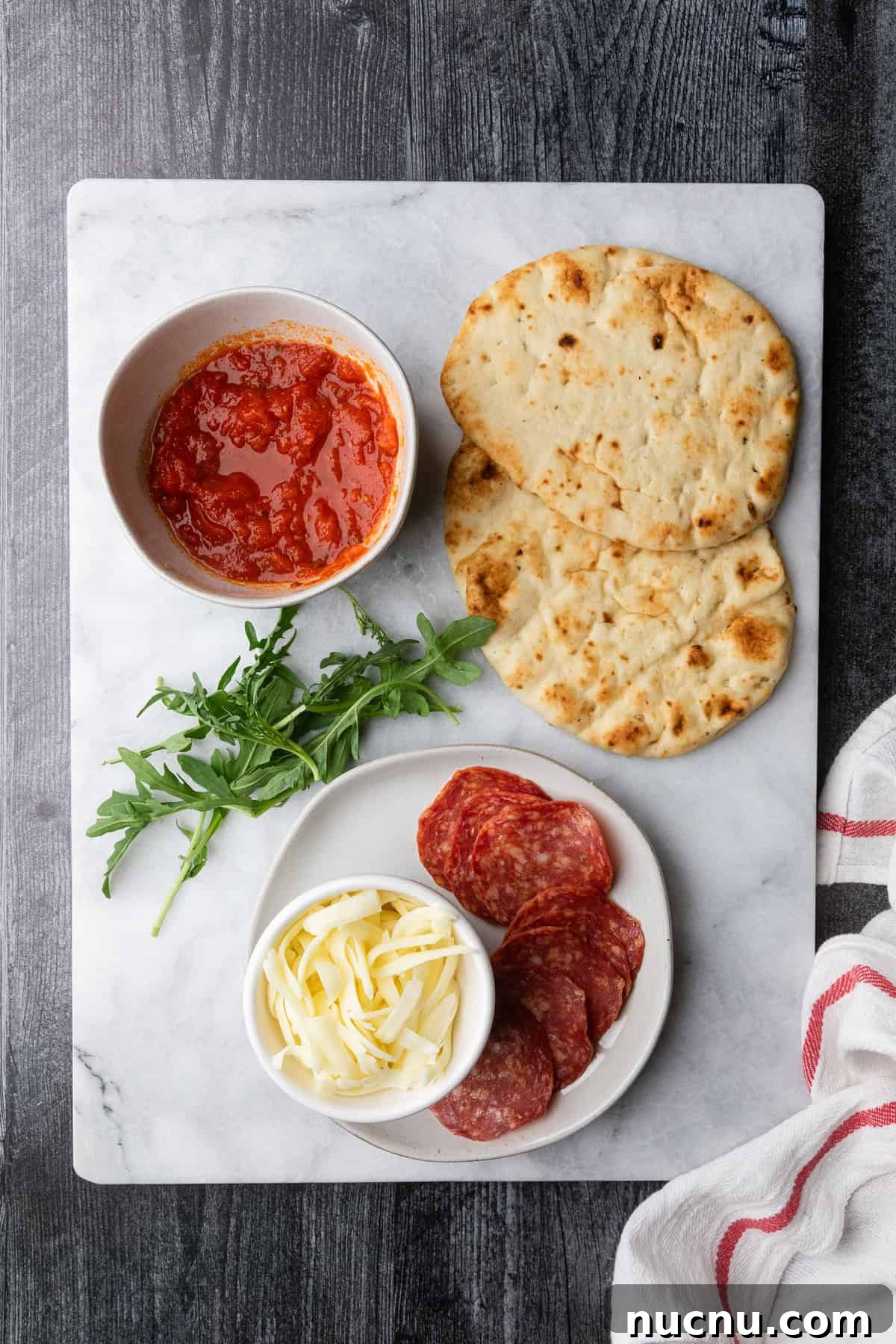 Crispy Air Fryer Naan Pizza Recipe for Quick Weeknight Meals 3 Ingredients to make the pizza.
