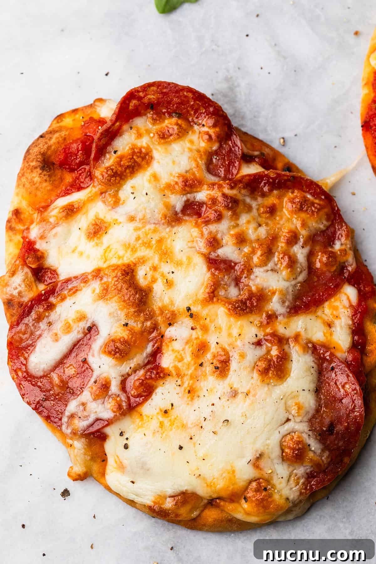 Crispy Air Fryer Naan Pizza Recipe for Quick Weeknight Meals 7 Air fryer naan pizza completed.