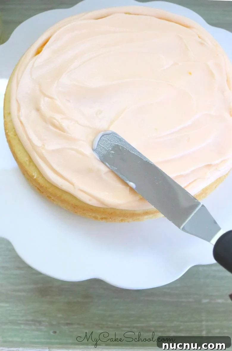 Lemon and Orange Layer Cake Recipe for Zesty Citrus Dessert 5 This Lemon Orange Cake Recipe is so moist and delicious! Lemon cake layers with orange curd filling and orange cream cheese frosting.