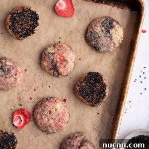 Strawberry and Black Sesame Cookies Recipe for Flavorful Cookies 10 Strawberry black sesame cookies on a baking sheet