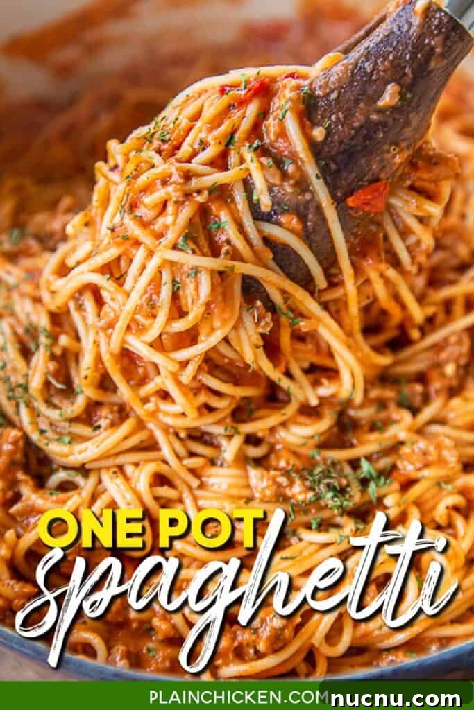 One-Pot No-Boil Spaghetti: Quick Saucy Pasta Dinner 2 pulling spaghetti from pot with tongs