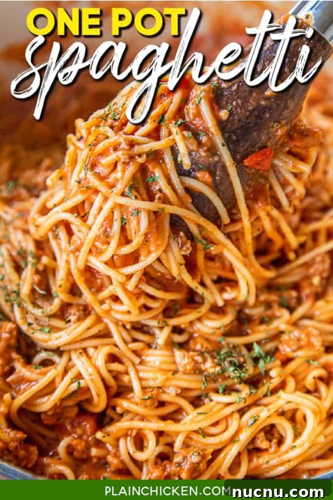 One-Pot No-Boil Spaghetti: Quick Saucy Pasta Dinner 5 pulling pasta from pot with tongs