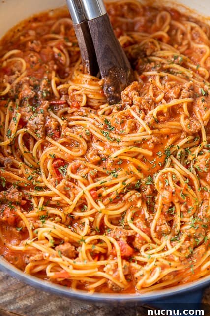 one pot spaghetti spaghetti and sauce in a cooking pot