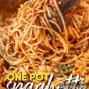 One-Pot No-Boil Spaghetti: Quick Saucy Pasta Dinner 3 pulling spaghetti from pot with tongs