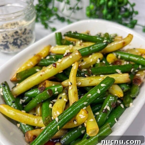 frozen green beans with sesame seeds and a soy sauce drizzle