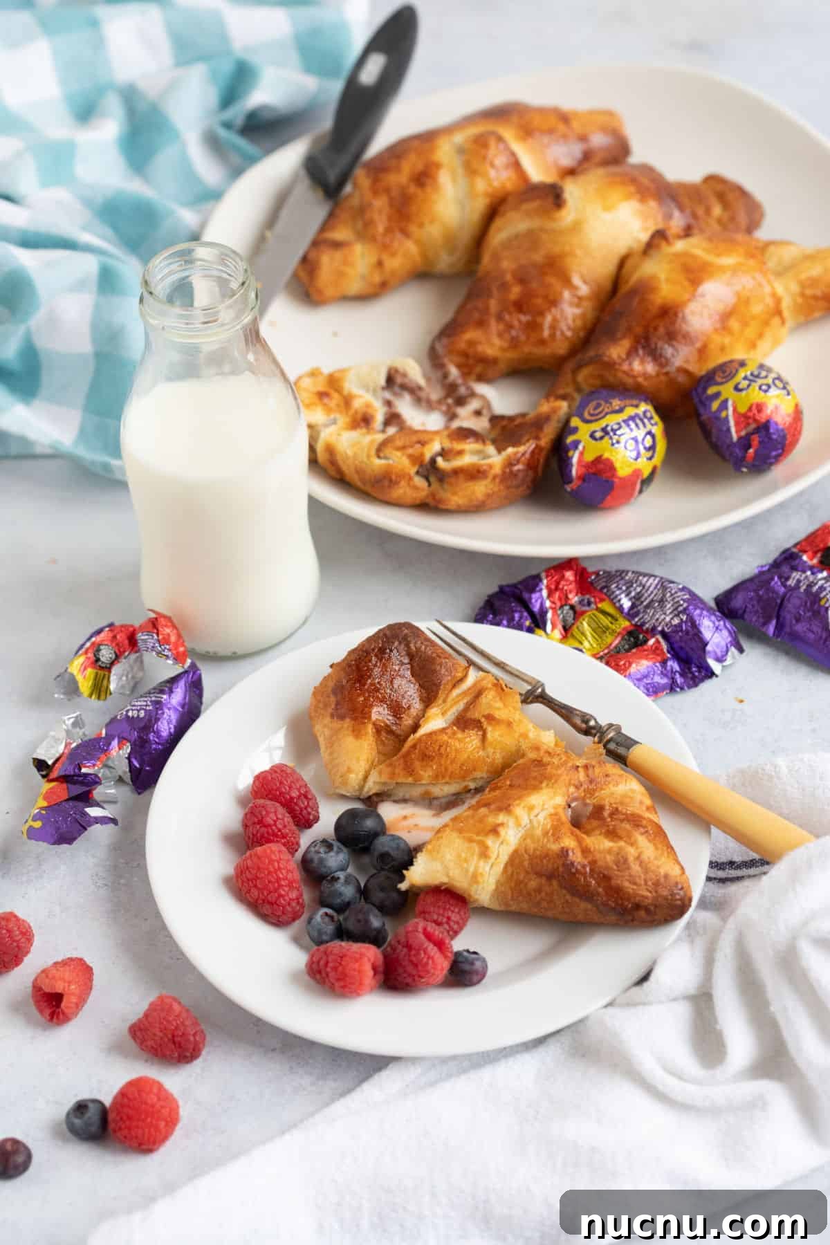 Air Fryer Creme Egg Croissant Recipe: Crispy Chocolate & Custard Croissant 12 Creme egg croissants with fresh berries and a glass of milk.