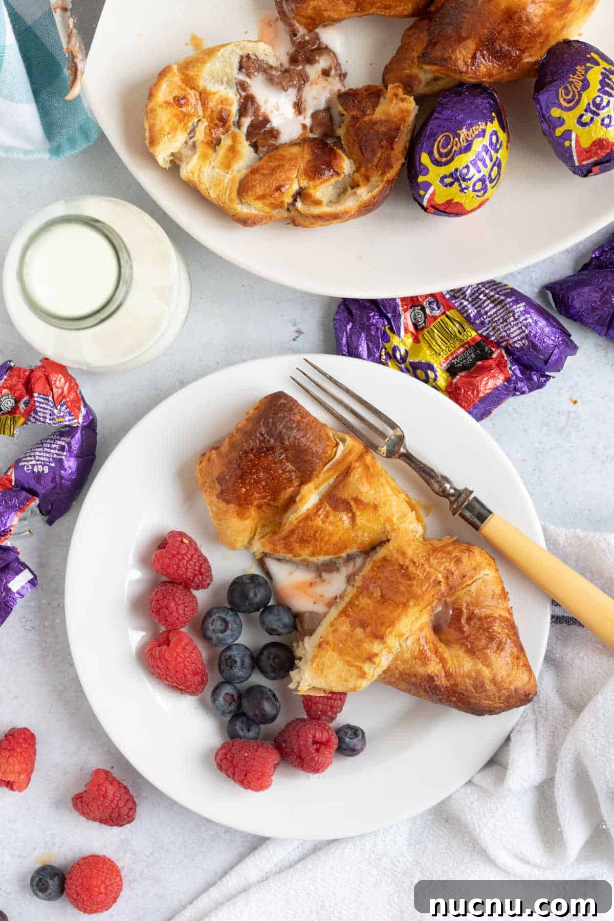 Air Fryer Creme Egg Croissant Recipe: Crispy Chocolate & Custard Croissant 6 Cream egg croissants with fresh berries.