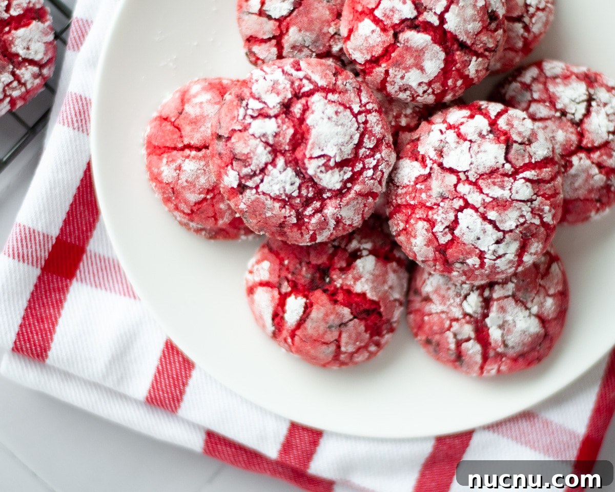 25 Unique Cookie Recipes You’ll Want to Bake Now 22 a plate of chocolate cherry crinkle cookies.