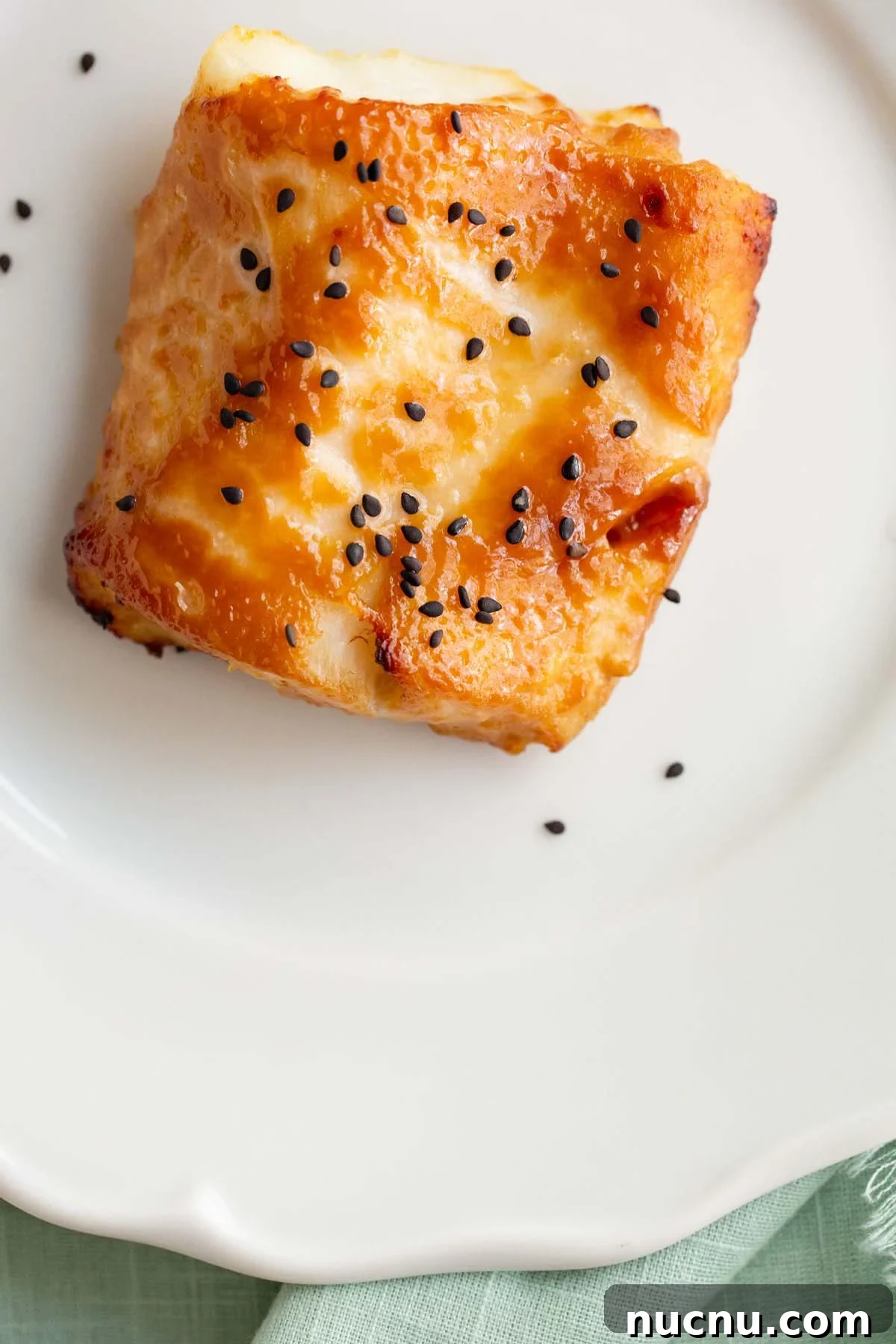 Crispy Air Fryer Miso Cod Recipe — Quick Weeknight Dinner 2 Air fryer miso cod up close topped with black sesame seeds