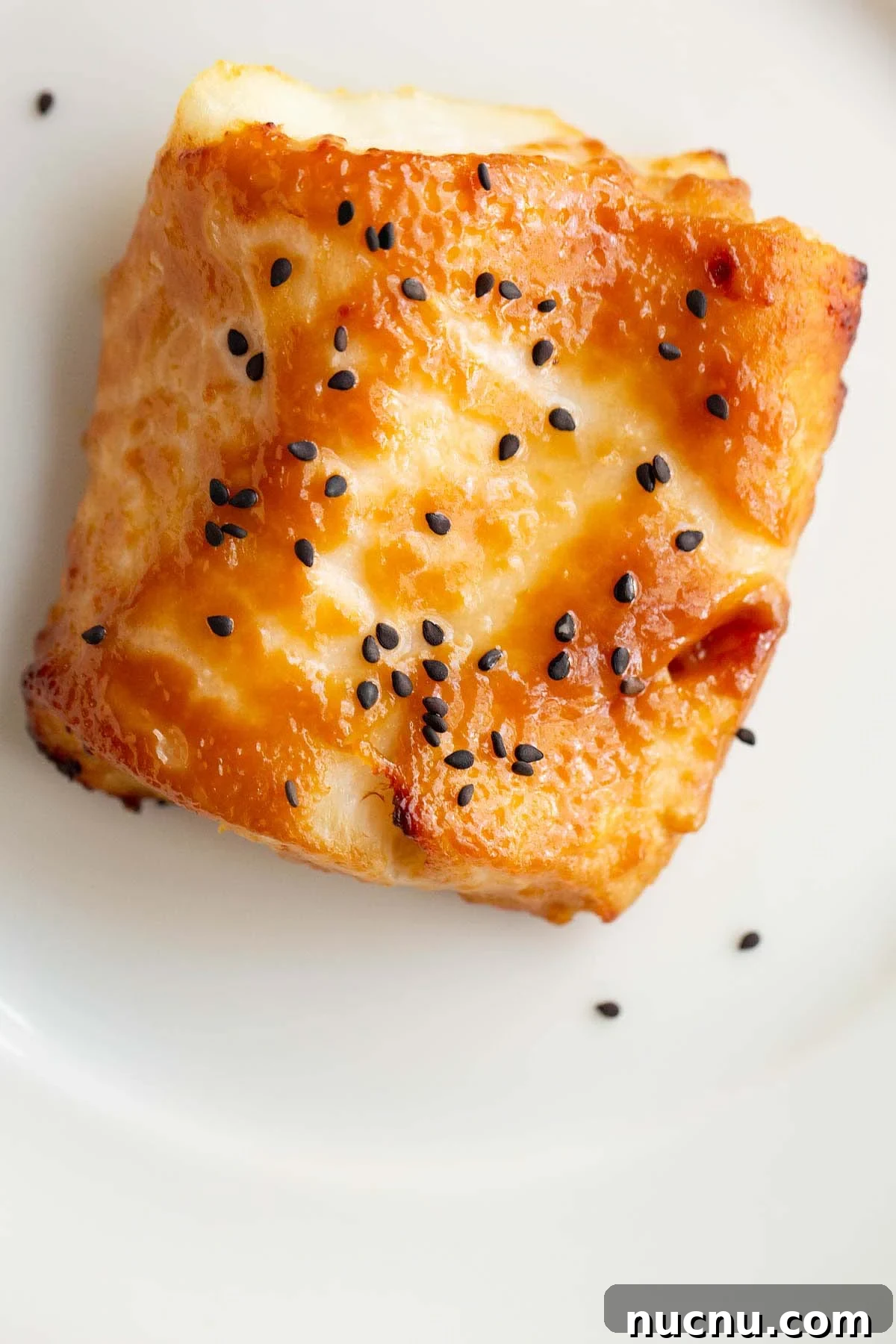 Crispy Air Fryer Miso Cod Recipe — Quick Weeknight Dinner 7 Air fryer miso cod up close topped with black sesame seeds