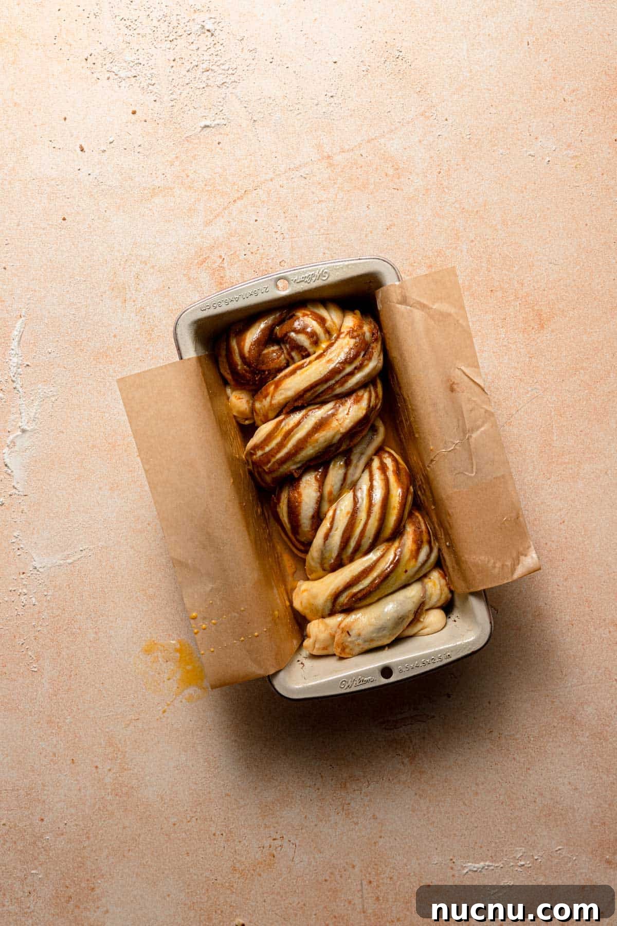 unbaked cinnamon babka in a pan.