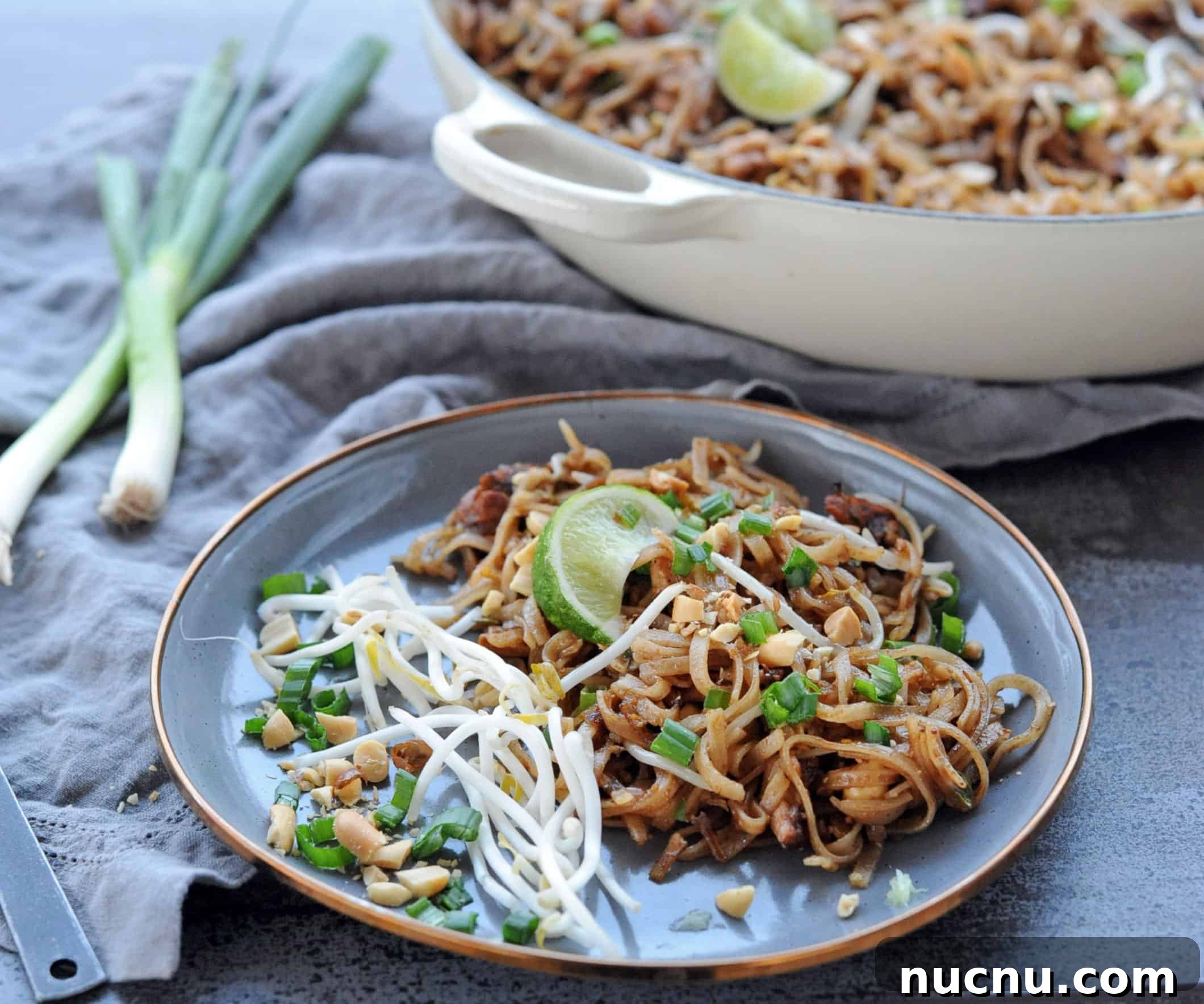 Grilled Pad Thai Recipe: Smoky Stir-Fried Noodles with Shrimp and Peanuts 10 Grilled Pad Thai on a gray plate.