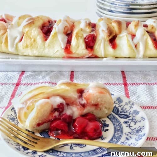 full cherry cream cheese braid and slice with fork.