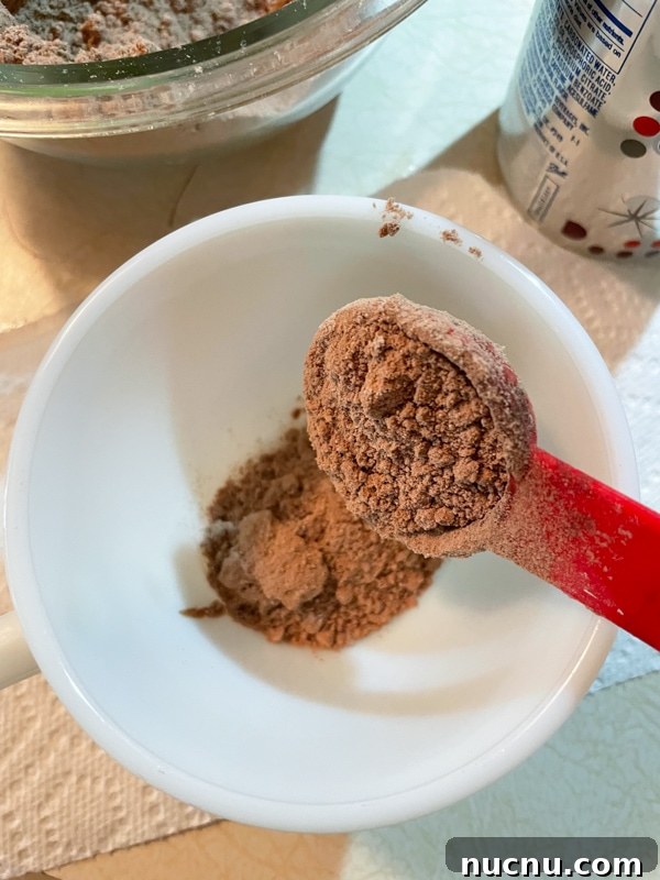 Quick Chocolate Mug Cake from Cake Mix in Minutes 4 Spoon mixing mug cake