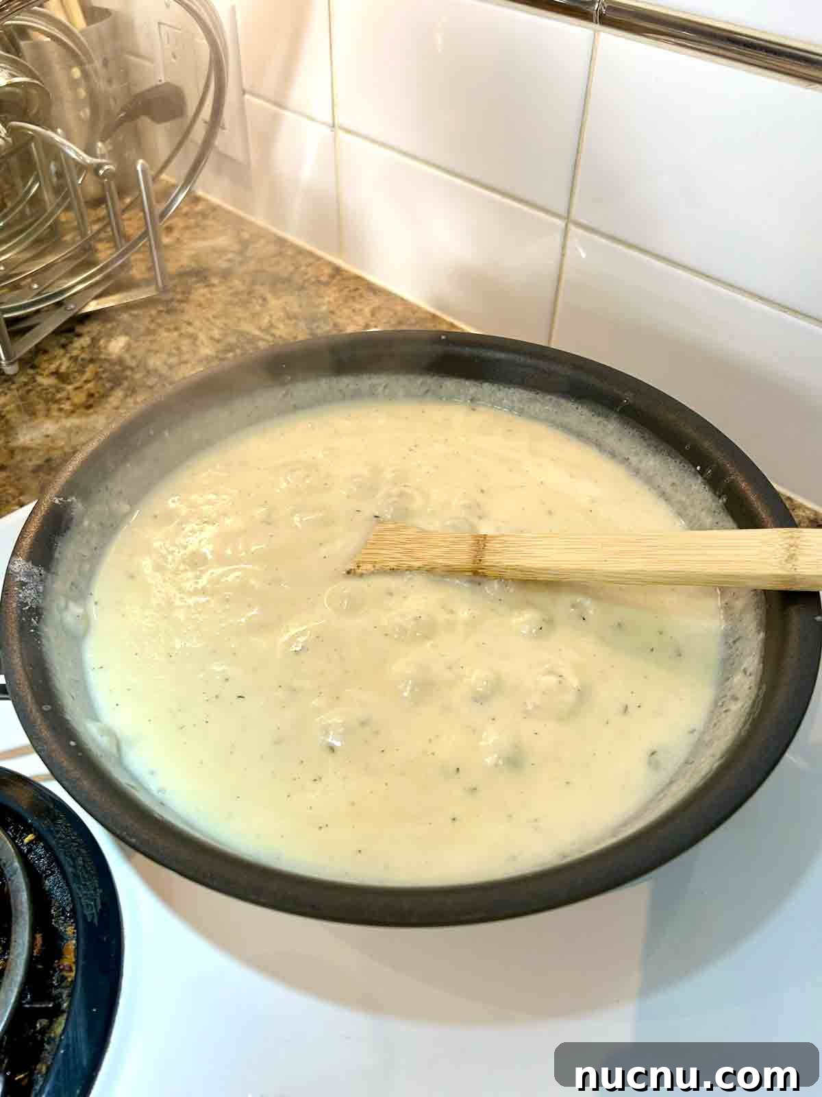Creamy Scalloped Potatoes with Ham Casserole Recipe 6 milk and chicken stock whisked into roux.