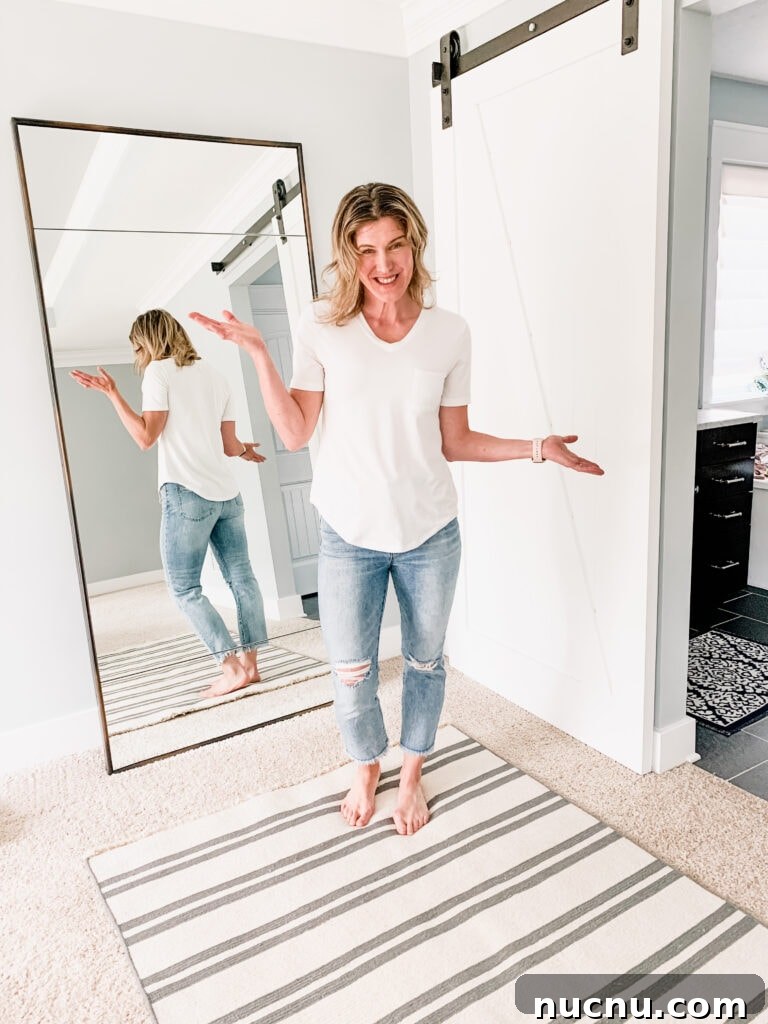 a woman in jeans and the perfect white tee